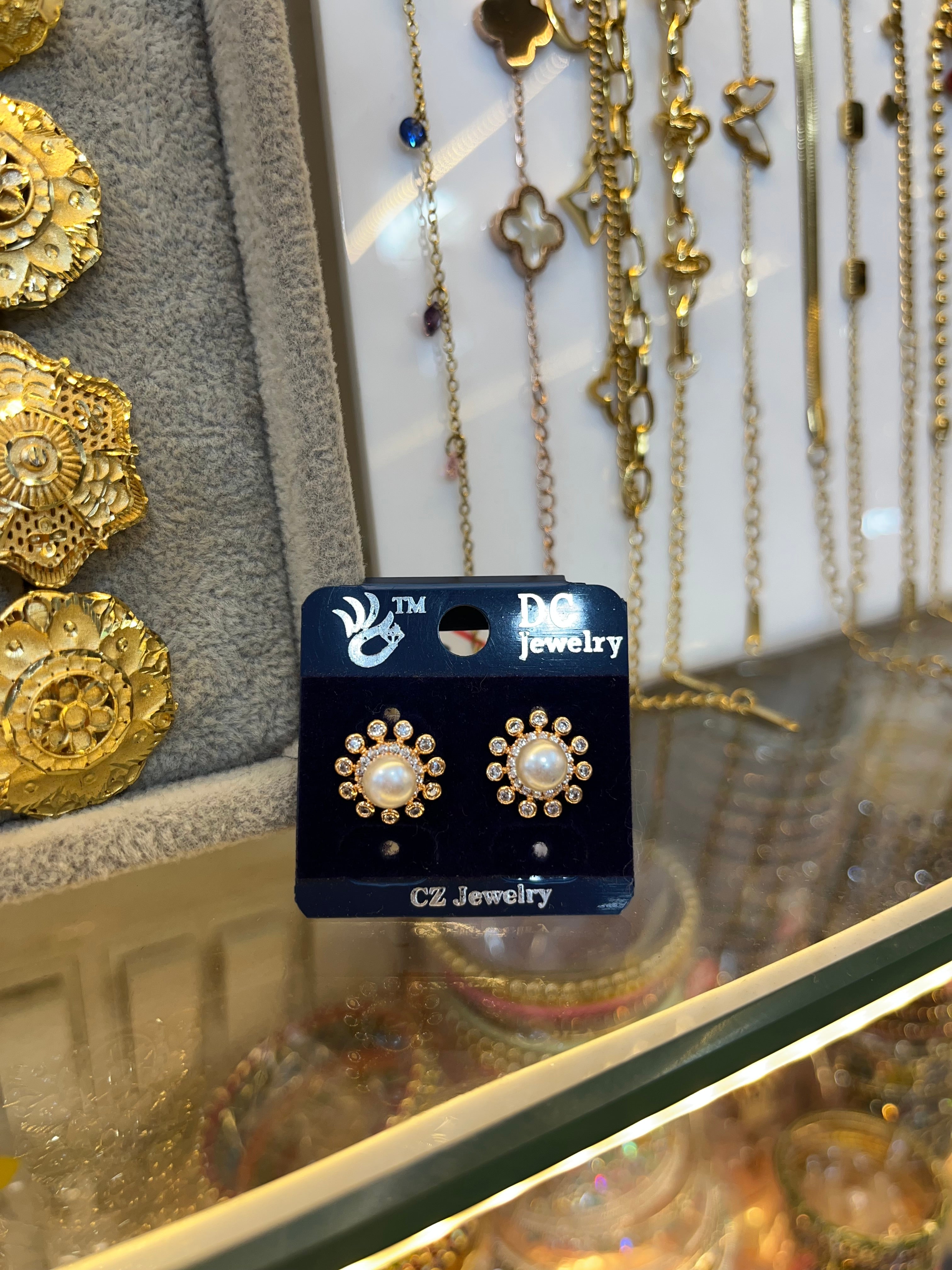 Elegant Gold Pearl Stud Earrings with CZ Halo